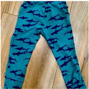 Old navy brand pants in a size 3t. Shark design